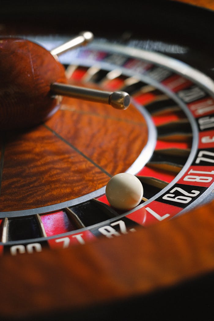 Detailed shot of a roulette wheel capturing the moment of suspense during a spin.